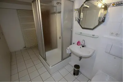 Ein Badezimmer in der Unterkunft Strand-Villa, Nige Ooge