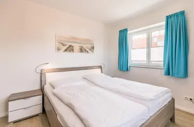 Ein Bett oder Betten in einem Zimmer der Unterkunft 