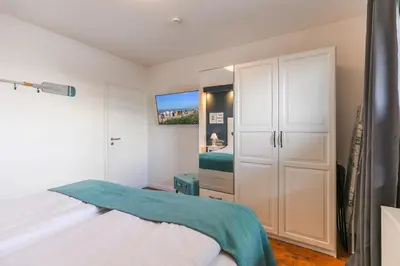 Ein Bett oder Betten in einem Zimmer der Unterkunft 