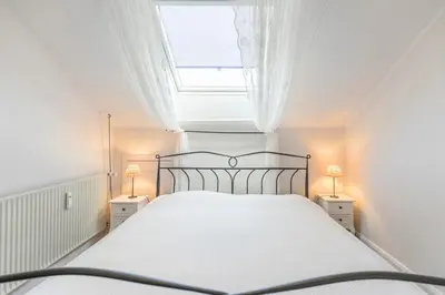 Ein Bett oder Betten in einem Zimmer der Unterkunft Jessica Jessica, Whg 16