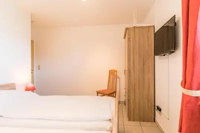 Ein Bett oder Betten in einem Zimmer der Unterkunft 