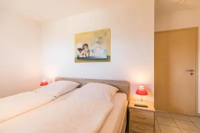 Ein Bett oder Betten in einem Zimmer der Unterkunft 