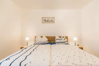 Ein Bett oder Betten in einem Zimmer der Unterkunft 