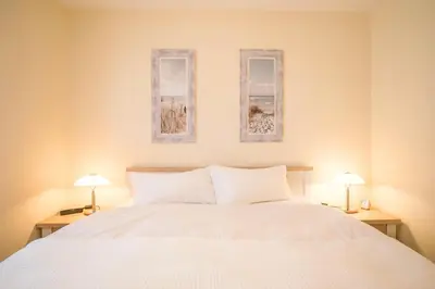 Ein Bett oder Betten in einem Zimmer der Unterkunft 