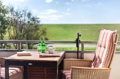 Ein Balkon oder eine Terrasse in der Unterkunft 