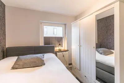 Ein Bett oder Betten in einem Zimmer der Unterkunft 
