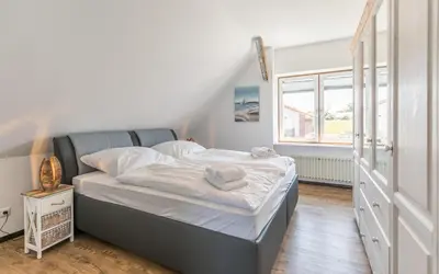 Ein Bett oder Betten in einem Zimmer der Unterkunft Ferienhaus Ben Ferienhaus Ben