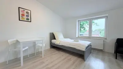 Ein Bett oder Betten in einem Zimmer der Unterkunft Monteurwohnung Brunsbüttel zentrale Lage mit Parkplatz & Schleusenblick