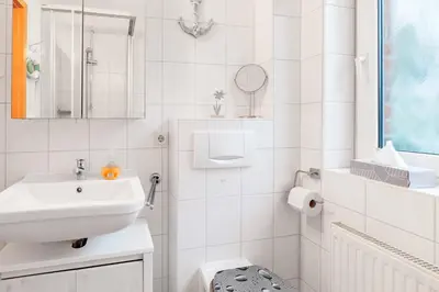 Ein Badezimmer in der Unterkunft 