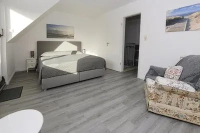 Ein Bett oder Betten in einem Zimmer der Unterkunft Haus im Törn Haus im Törn, Whg 1