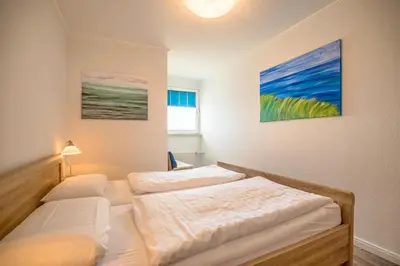 Ein Bett oder Betten in einem Zimmer der Unterkunft 