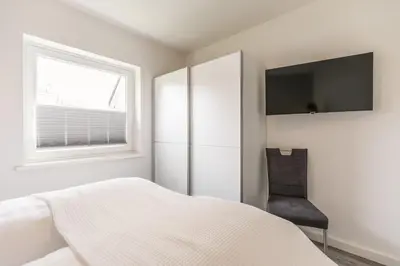 Ein Bett oder Betten in einem Zimmer der Unterkunft 