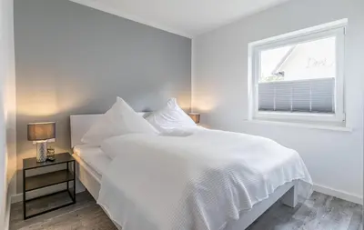 Ein Bett oder Betten in einem Zimmer der Unterkunft 