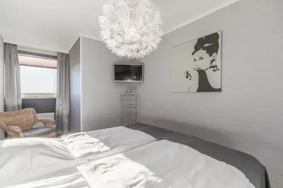 Ein Bett oder Betten in einem Zimmer der Unterkunft 