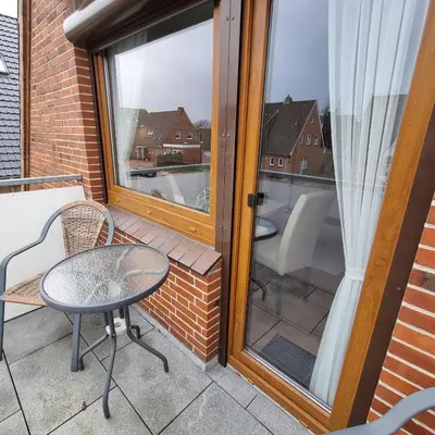 Ein Balkon oder eine Terrasse in der Unterkunft Haus Kaiser Appartement 4 Deichsommer