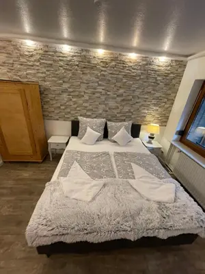 Ein Bett oder Betten in einem Zimmer der Unterkunft Haus Kaiser Appartement 16 Großer Deichtraum