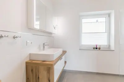 Ein Badezimmer in der Unterkunft Deichidyll Deichidyll, Whg Glücksmomente