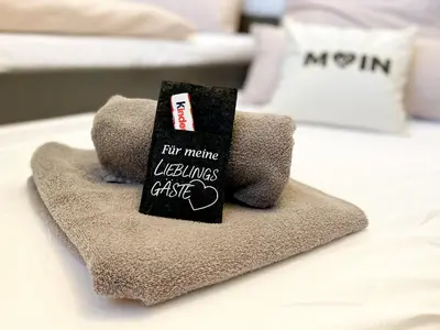 Ein Bett oder Betten in einem Zimmer der Unterkunft Familienfreundliches Ferienhaus in 5 min zum Strand mit Terrasse und kostenlosem Parkplatz
