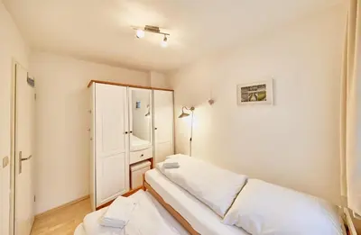 Ein Bett oder Betten in einem Zimmer der Unterkunft Stranddüne - Cuxi