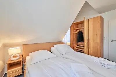 Ein Bett oder Betten in einem Zimmer der Unterkunft Strandburg - 12