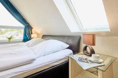 Ein Bett oder Betten in einem Zimmer der Unterkunft Strandburg - 12