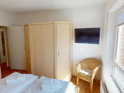 Ein Bett oder Betten in einem Zimmer der Unterkunft Strandburg - 6