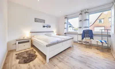 Ein Bett oder Betten in einem Zimmer der Unterkunft Strandhus Cuxi - 1