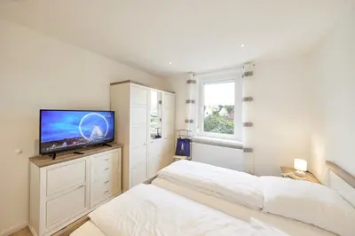 Ein Bett oder Betten in einem Zimmer der Unterkunft Strandhus Cuxi - 2