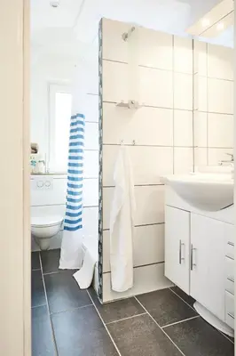 Ein Badezimmer in der Unterkunft Strandhus Cuxi - 2