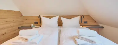 Ein Bett oder Betten in einem Zimmer der Unterkunft Haus Oasis - 18