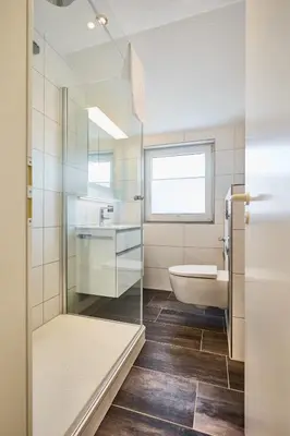 Ein Badezimmer in der Unterkunft Haus Oasis - 18