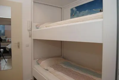 Ein Bett oder Betten in einem Zimmer der Unterkunft Hanseatic 101