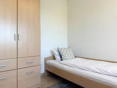 Ein Bett oder Betten in einem Zimmer der Unterkunft Haus am Waldbad Whg 1