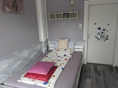 Ein Bett oder Betten in einem Zimmer der Unterkunft Bi uns im Norden