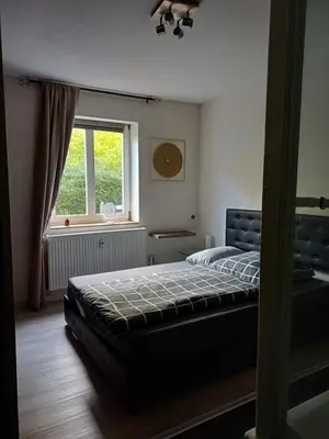 Ein Bett oder Betten in einem Zimmer der Unterkunft Bi uns im Norden
