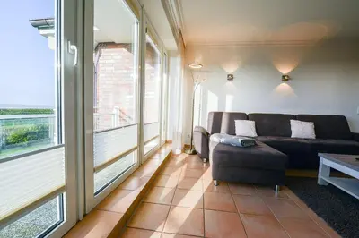 Ein Sitzbereich in der Unterkunft Haus Residenz Dünenweg RD19