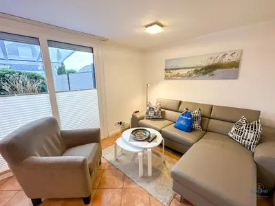 Ein Sitzbereich in der Unterkunft Ferienhaus Seepferdchen Duhnen