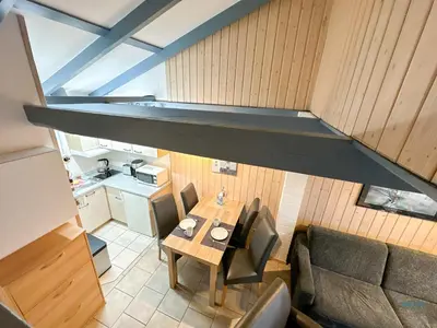 Ein Sitzbereich in der Unterkunft Ferienhaus Am Ringwall 112a Duhnen