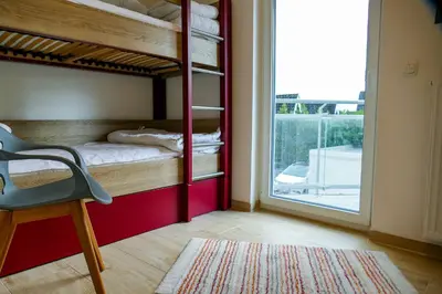 Ein Bett oder Betten in einem Zimmer der Unterkunft Haus Dünenweg 37 DU03