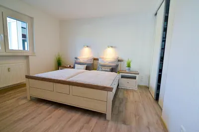 Ein Bett oder Betten in einem Zimmer der Unterkunft Am Sahlenburger Strand AS06