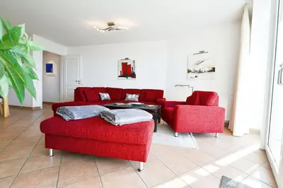 Ein Sitzbereich in der Unterkunft Strandpalais PB16