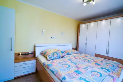 Ein Bett oder Betten in einem Zimmer der Unterkunft Am Sahlenburger Strand AS33