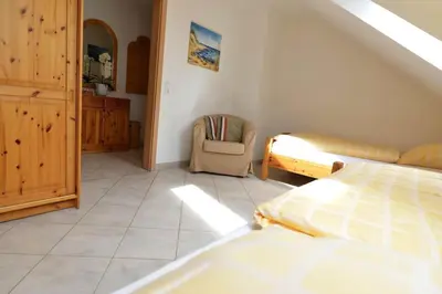 Ein Bett oder Betten in einem Zimmer der Unterkunft Haus Horizont H513