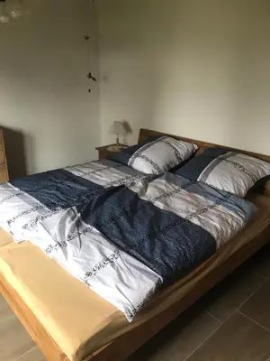 Ein Bett oder Betten in einem Zimmer der Unterkunft Ferienhaus am Heringskoop