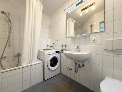 Ein Badezimmer in der Unterkunft Nordseebrandung A3 1