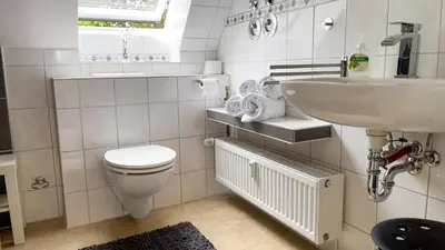 Ein Badezimmer in der Unterkunft Leuchtfeuer 4