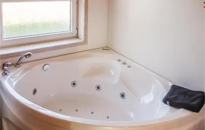 Ein Badezimmer in der Unterkunft Awesome Home In Otterndorf With Sauna
