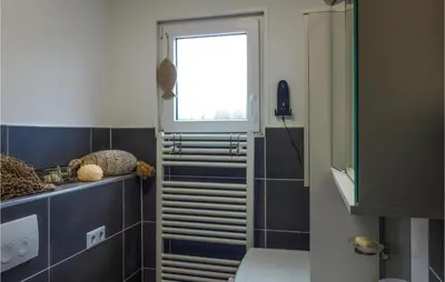Ein Badezimmer in der Unterkunft Amazing Apartment In Otterndorf