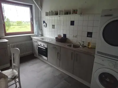 Küche/Küchenzeile in der Unterkunft Ferienwohnung Wremen