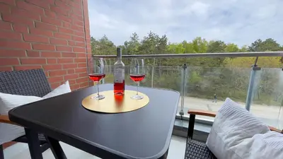 Ein Balkon oder eine Terrasse in der Unterkunft Nordseebrandung FeWo A4 3
